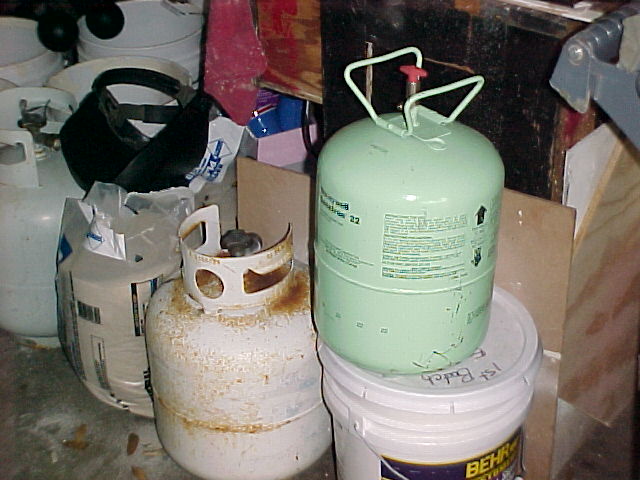 raw foundry materials propane tanks and freon tanks.jpg